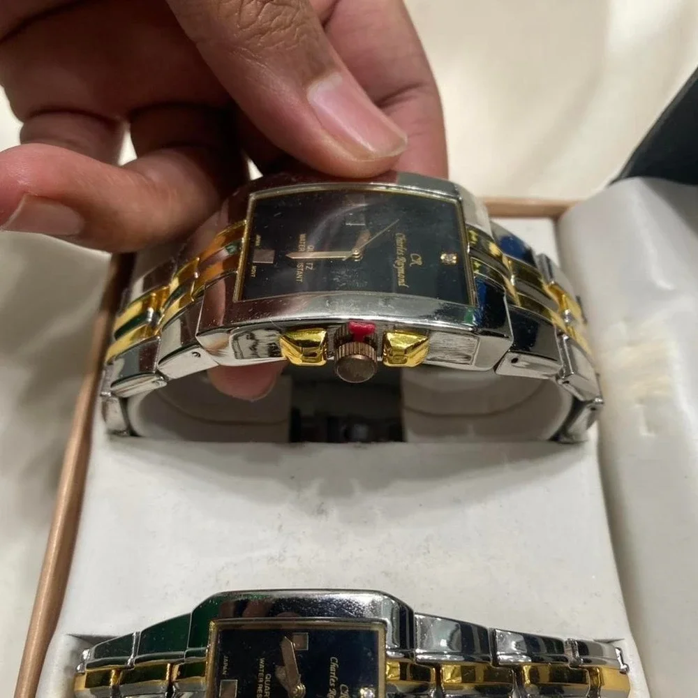 Vintage Charles Raymond His And Hers New York silver and gold watch set locks in